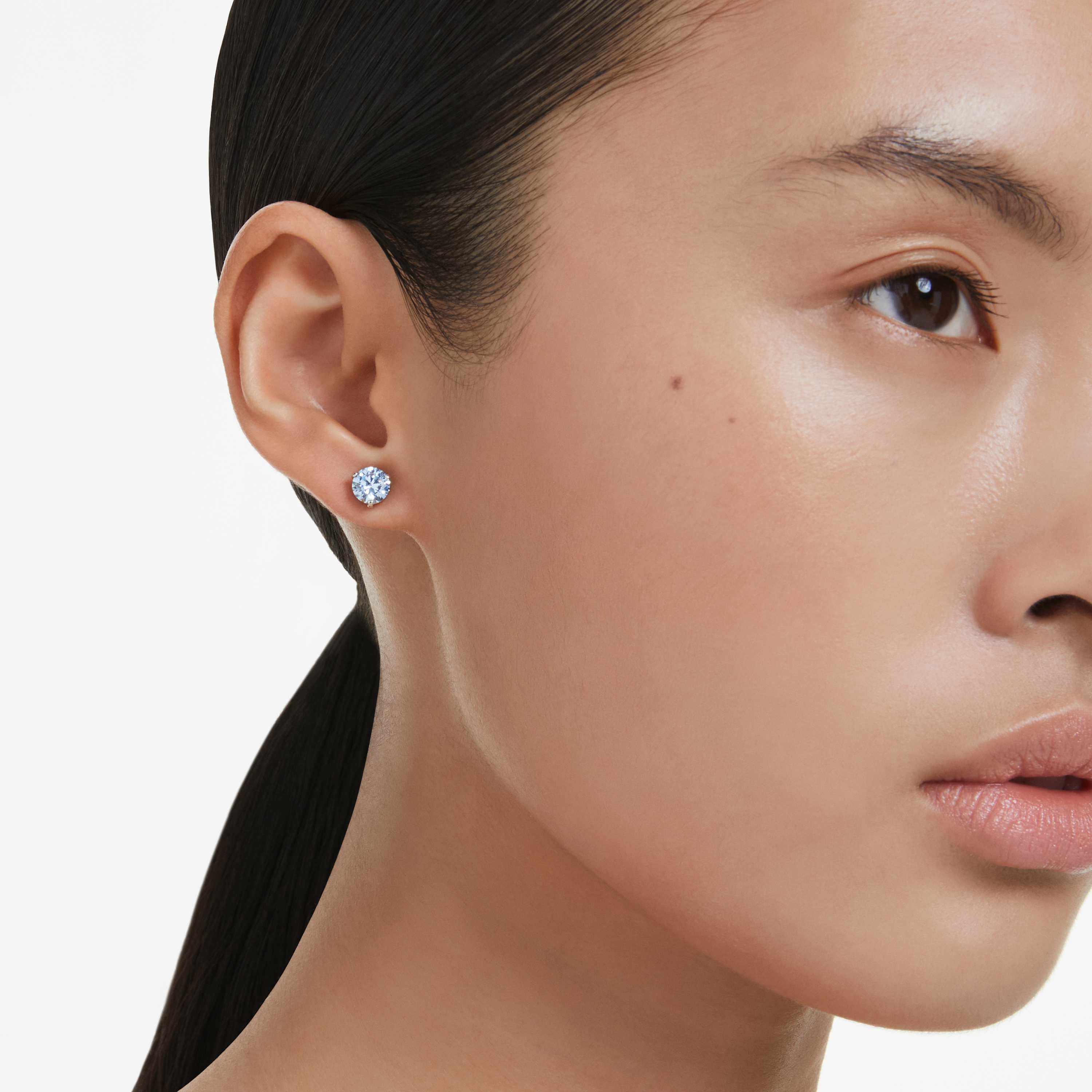 swarovski solitaire stud earrings  round cut  blue  rhodium plated