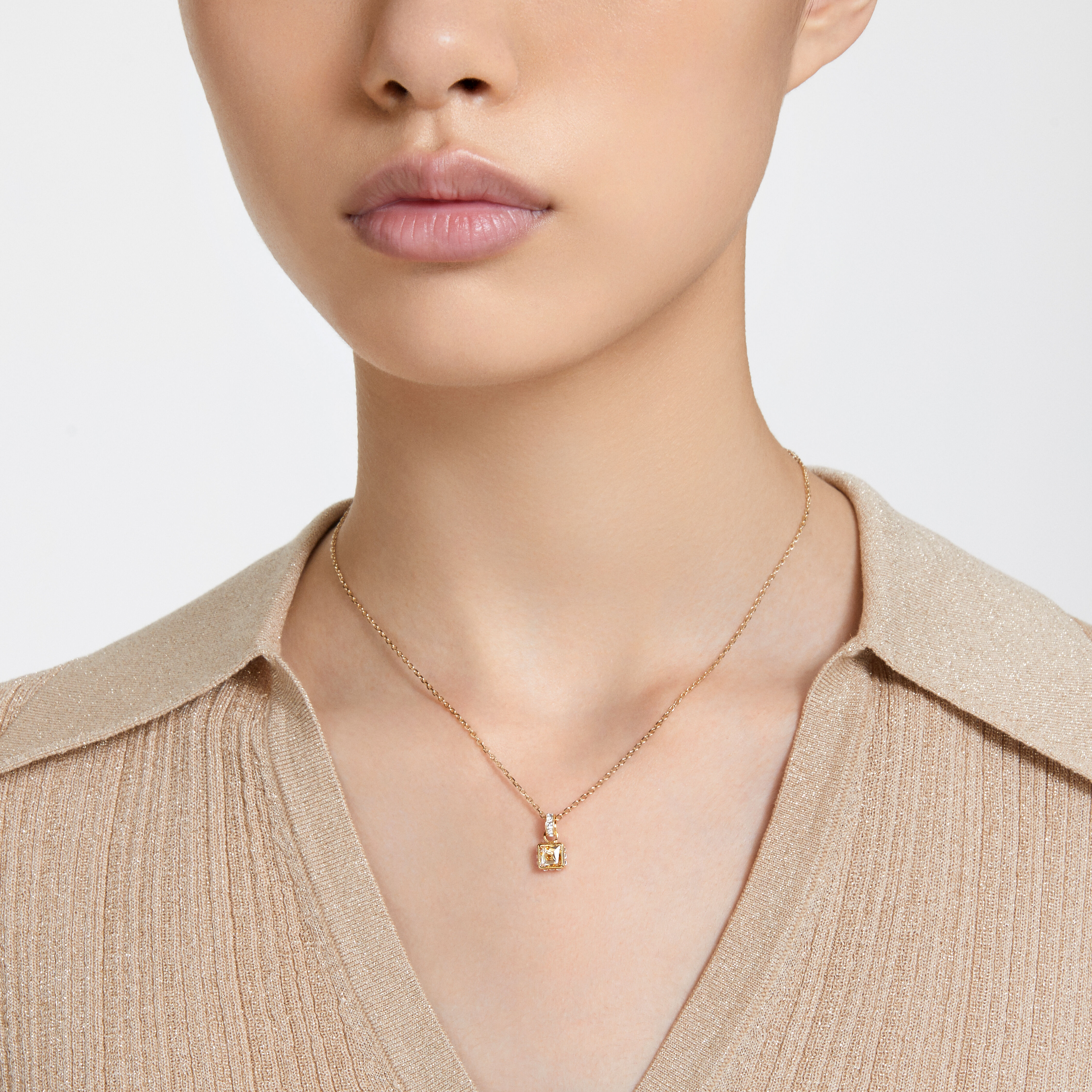 Swarovski gold pendant deals necklace