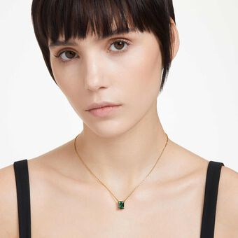swarovski stilla pendant  rectangular cut  green  gold tone plated