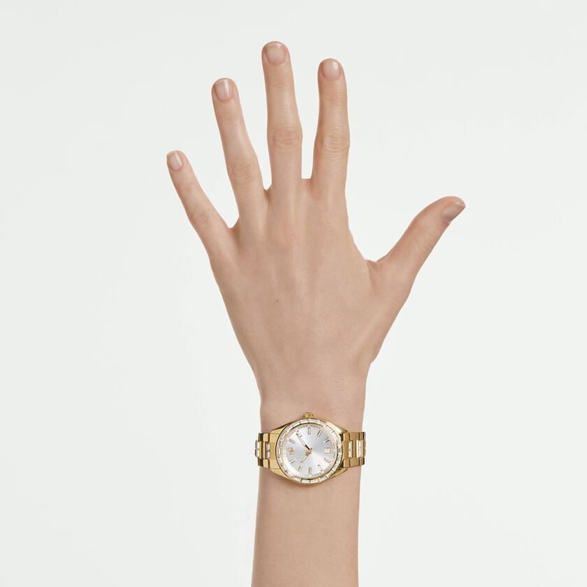 swarovski matrix date watch  swiss made  metal bracelet  gold tone  gold tone finish