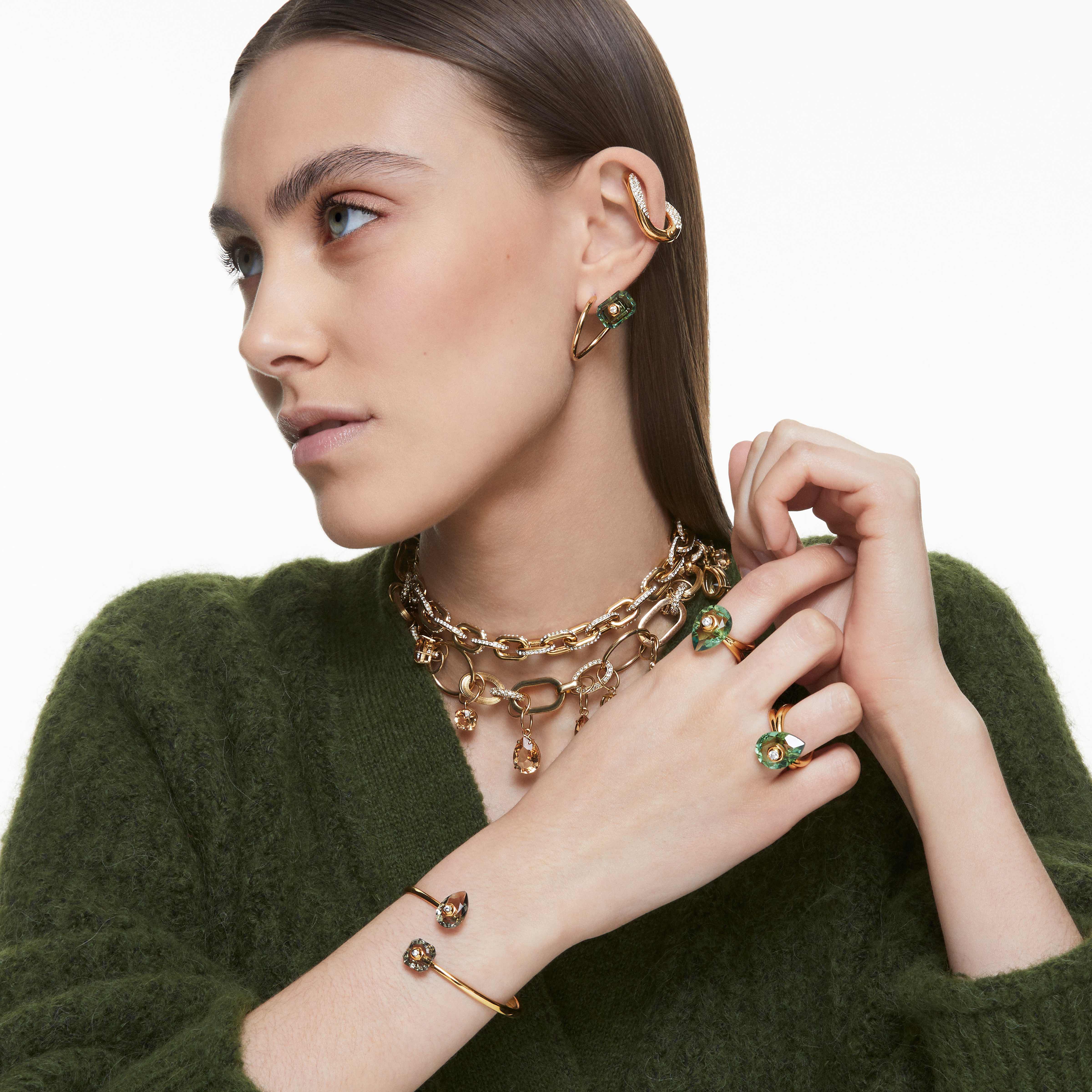 swarovski studiosa ring  green  gold tone plated