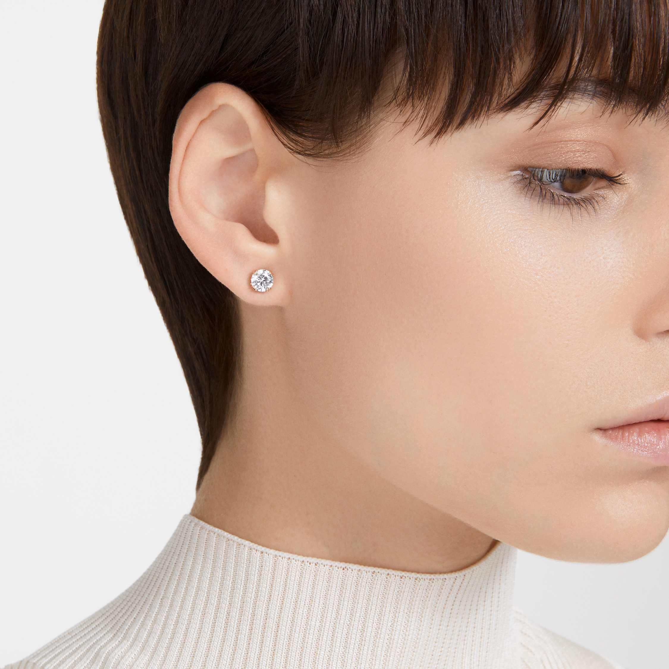 Rose gold solitaire earrings top