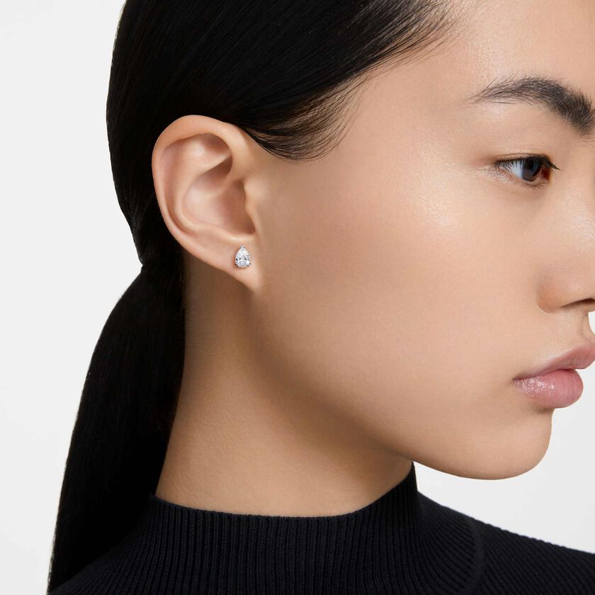 swarovski stilla stud earrings  pear cut  white  rhodium plated
